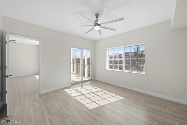 spare room with ceiling fan