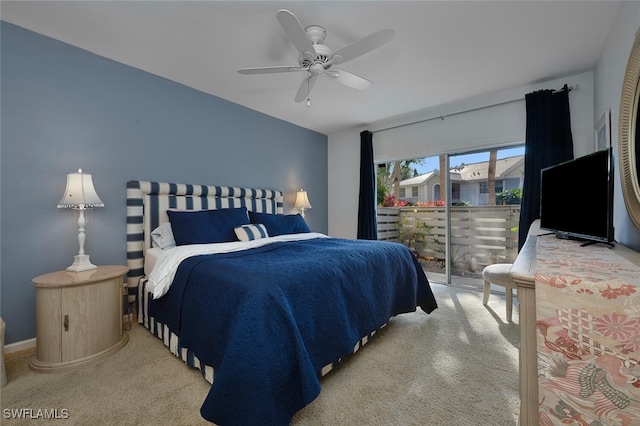 bedroom featuring access to exterior, baseboards, and a ceiling fan