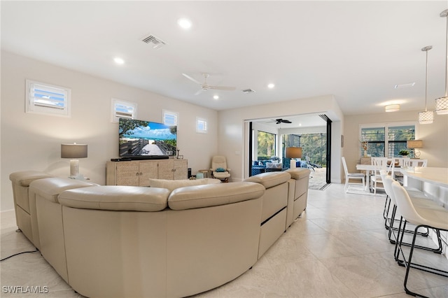 living room with ceiling fan