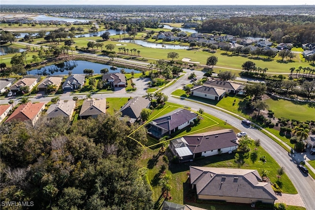 drone / aerial view with a water view