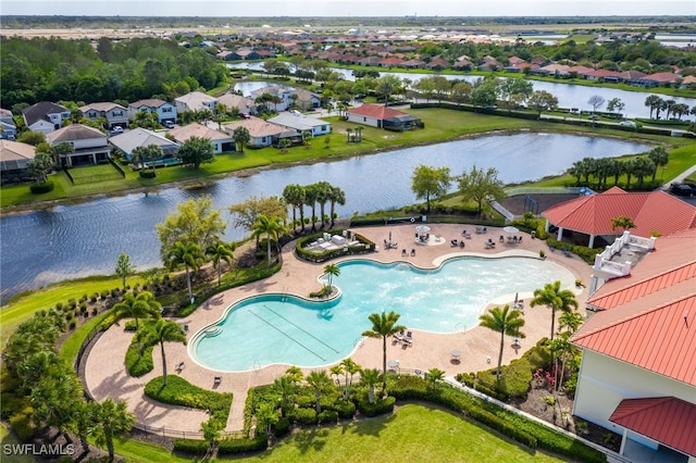 birds eye view of property featuring a water view