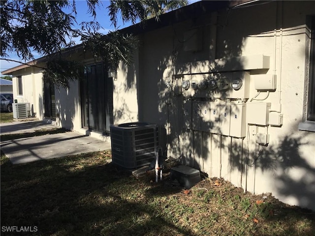 view of home's exterior featuring central AC