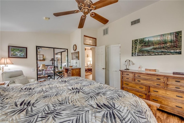 bedroom with ceiling fan and lofted ceiling