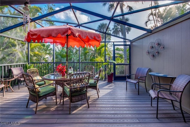 wooden deck with a lanai