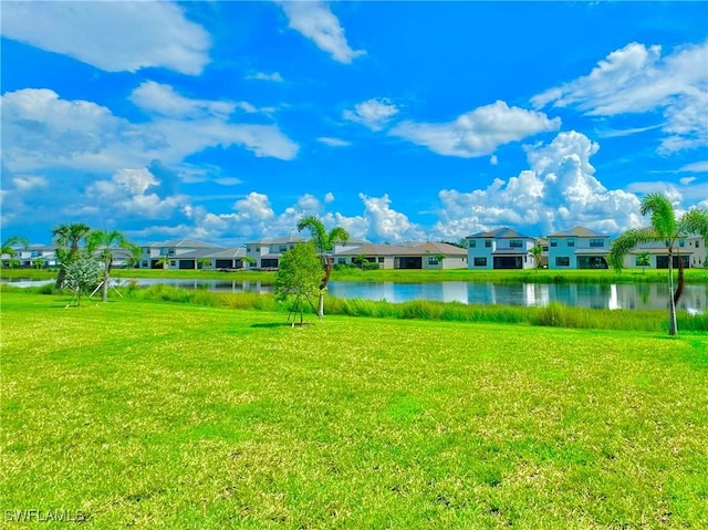 view of yard with a water view