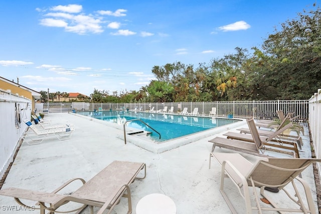 view of pool featuring a patio