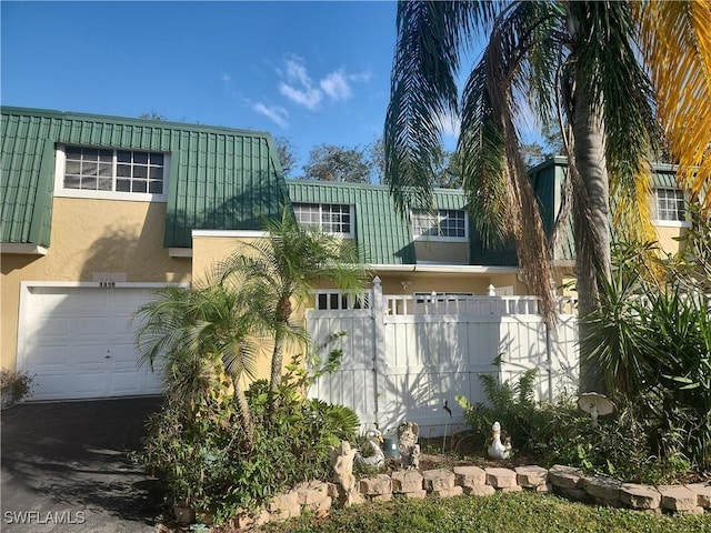 exterior space featuring a garage