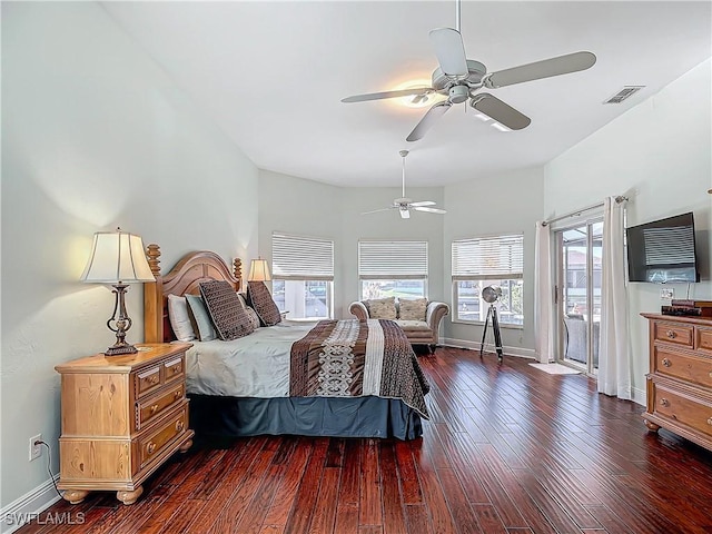 bedroom featuring dark hardwood / wood-style flooring and ceiling fan