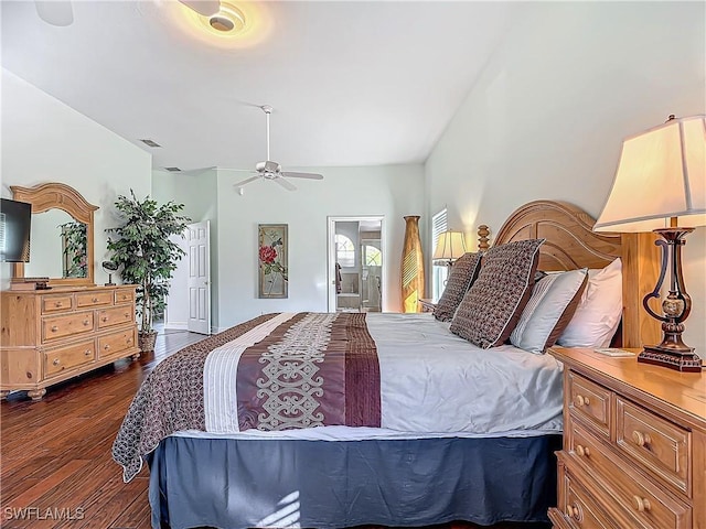 bedroom with dark hardwood / wood-style flooring and ceiling fan