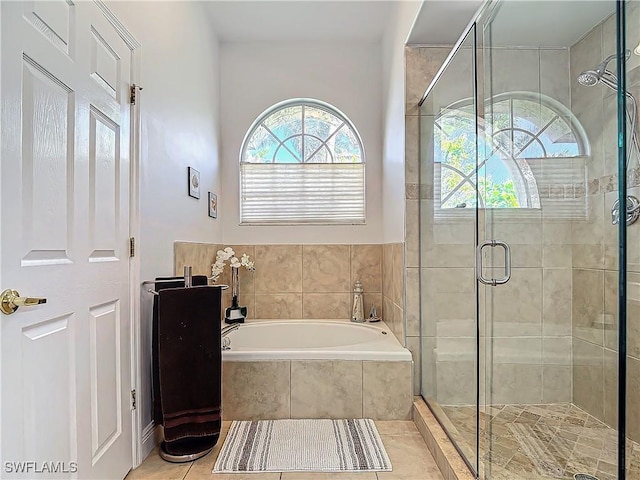 bathroom with plus walk in shower and tile patterned floors