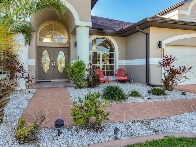 doorway to property featuring a garage