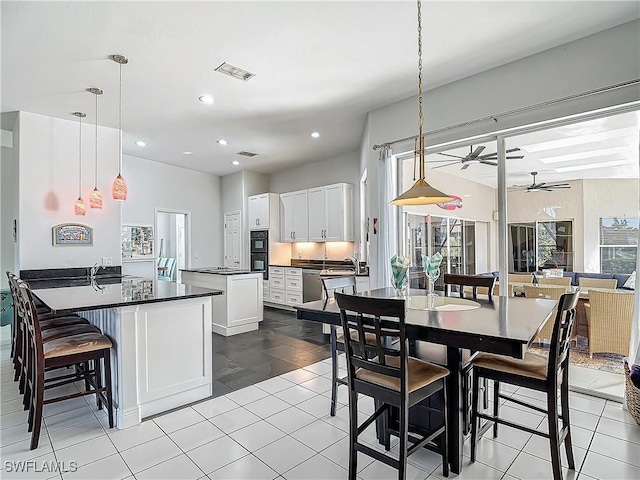 dining room with light tile patterned floors