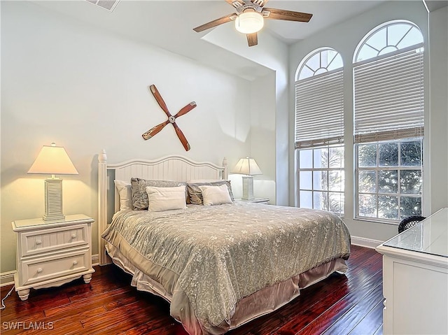 bedroom with hardwood / wood-style floors and ceiling fan