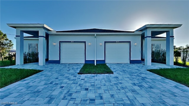 view of front of home with a garage