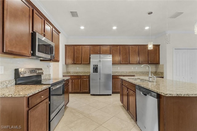 kitchen with appliances with stainless steel finishes, light stone counters, ornamental molding, sink, and decorative light fixtures