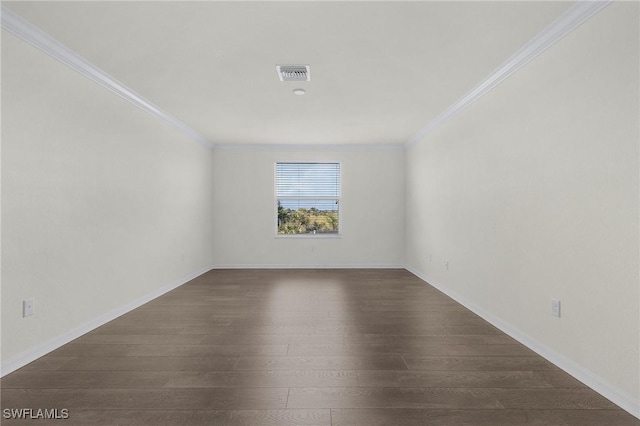 unfurnished room featuring dark hardwood / wood-style flooring and ornamental molding