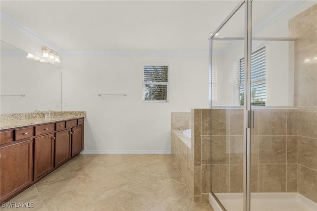 bathroom with vanity, ornamental molding, and independent shower and bath