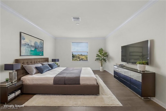 bedroom with dark wood-type flooring and ornamental molding