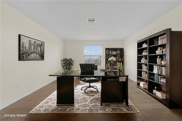 home office featuring hardwood / wood-style flooring