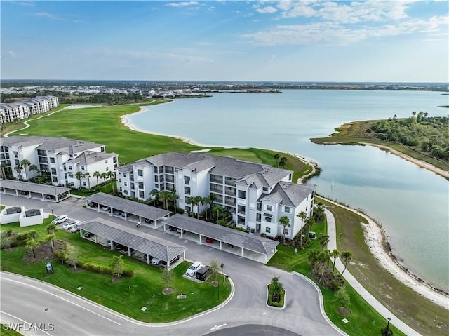 drone / aerial view featuring a water view