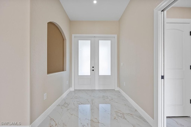 entryway featuring french doors