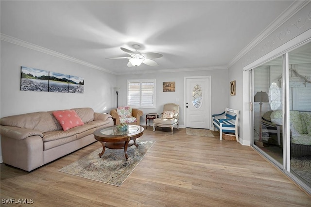 1549 Sandpiper St Unit 80, Naples, FL 34102 - living room with light wood finished floors, ornamental molding, and ceiling fan