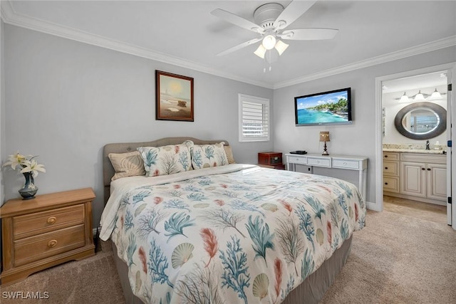 bedroom featuring ceiling fan, light colored carpet, ornamental molding, and ensuite bathroom