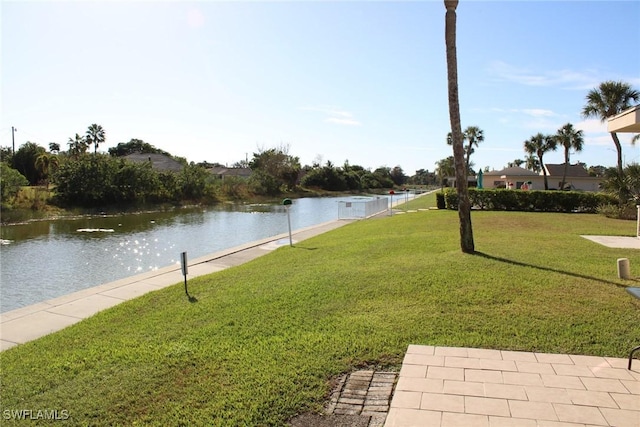 exterior space with a water view