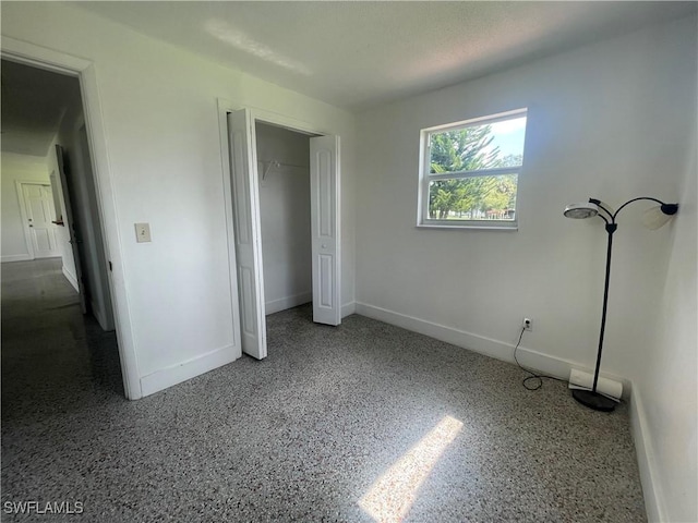 unfurnished bedroom featuring a closet