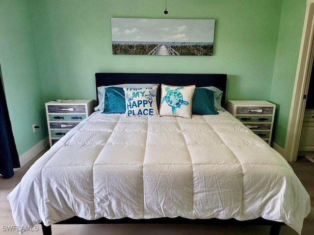 5023 SW 16th Pl Unit 101, Cape Coral, FL 33914 - bedroom with baseboards