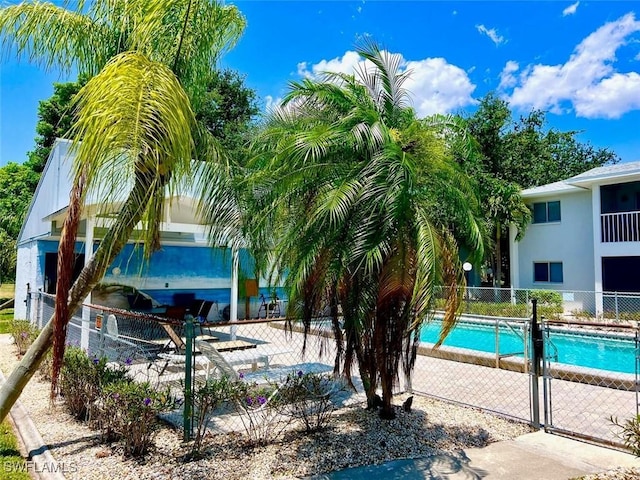 5023 SW 16th Pl Unit 101, Cape Coral, FL 33914 - community pool featuring a patio