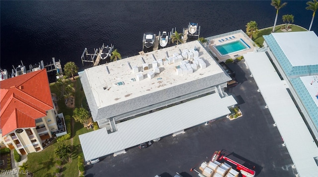 drone / aerial view with a water view