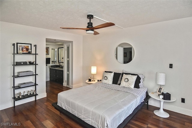 bedroom featuring a textured ceiling, ceiling fan, and dark wood-type flooring