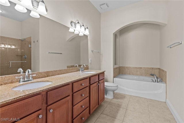 full bathroom featuring separate shower and tub, tile patterned floors, vanity, and toilet