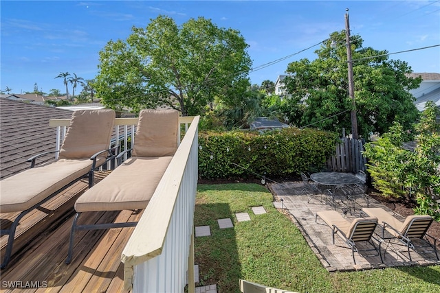 view of yard with a patio and fence