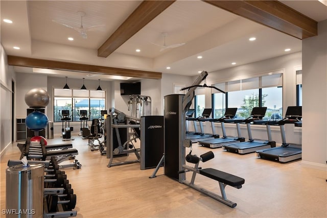 gym with a ceiling fan, a wealth of natural light, light wood-style floors, and recessed lighting