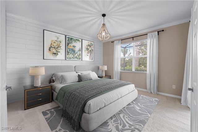 carpeted bedroom featuring crown molding