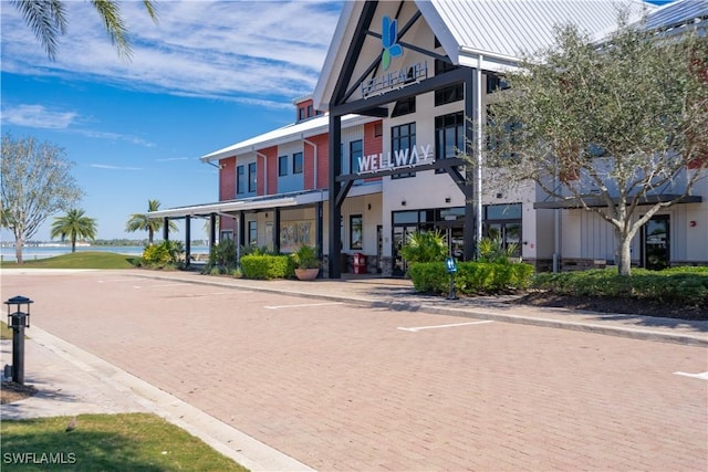 view of property with a water view