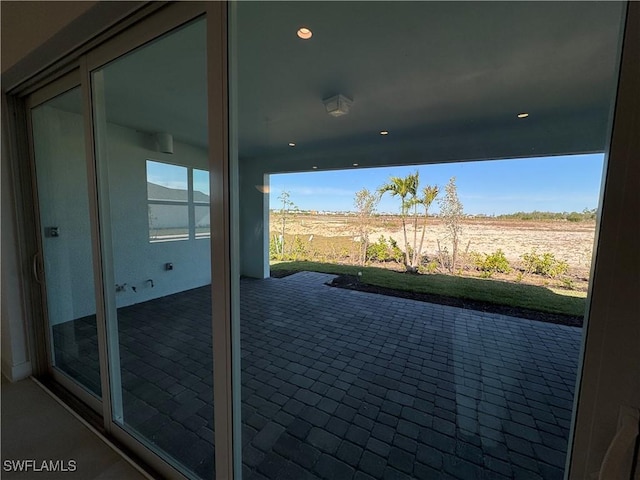 view of patio with a rural view