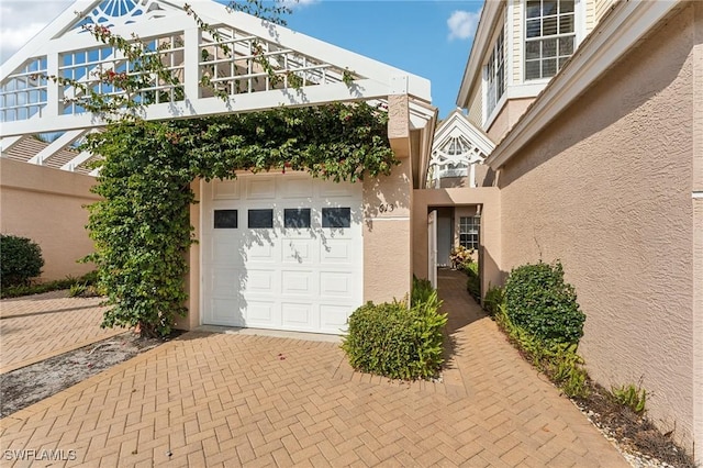 view of front of property with a garage