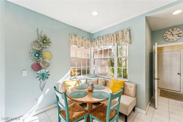 tiled dining room with breakfast area