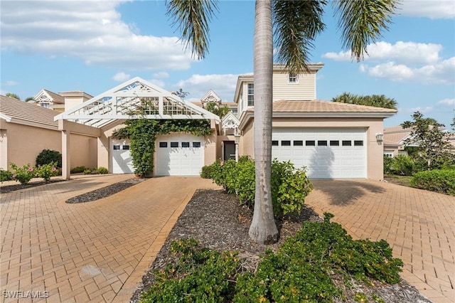 view of front of property featuring a garage