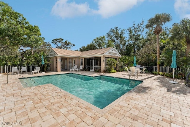 view of pool featuring a patio