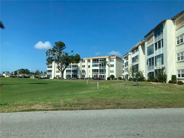 view of community with a lawn