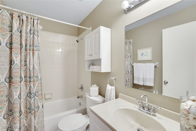 full bathroom with vanity, toilet, and shower / bath combo with shower curtain