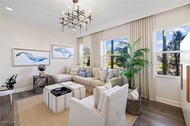 living room featuring hardwood / wood-style flooring and a notable chandelier