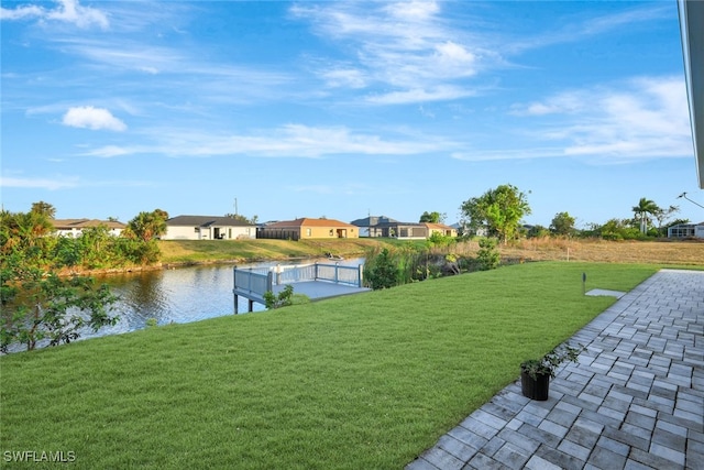 view of yard with a water view