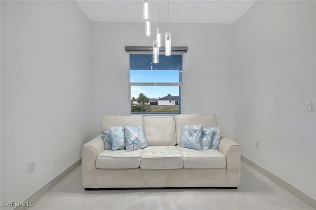 living area with an inviting chandelier