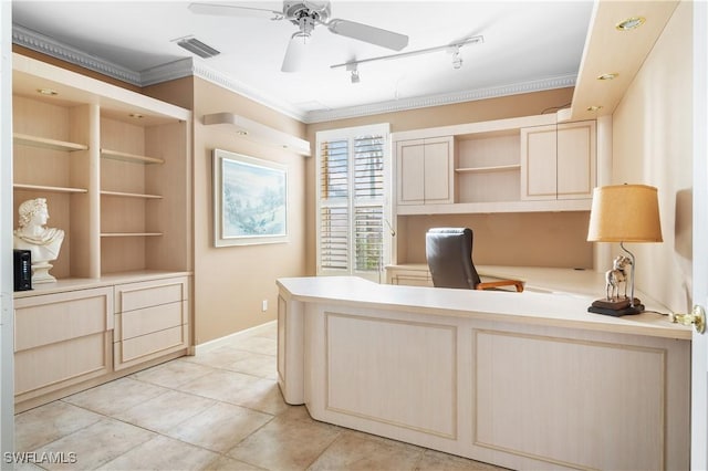 office featuring rail lighting, ceiling fan, and crown molding