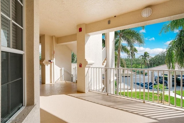 view of patio with a balcony